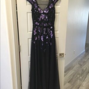Theia black cap sleeve formal evening gown with lilac sequin flowers